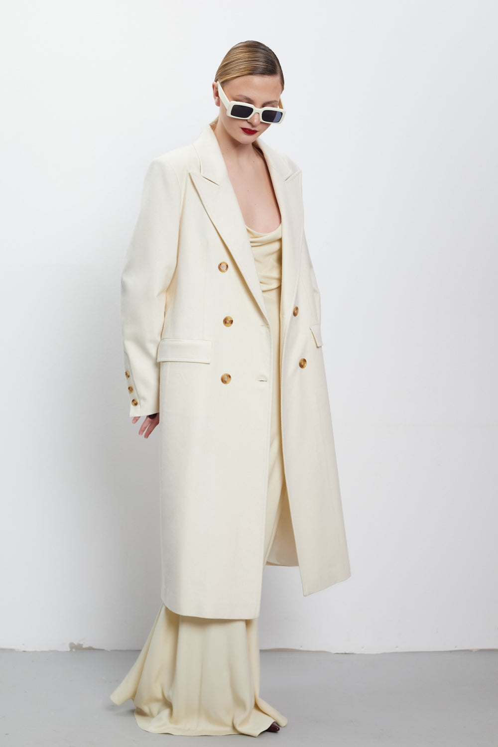 Double-breasted wool and alpaca coat in milky white on bulgarian designer Teadore P