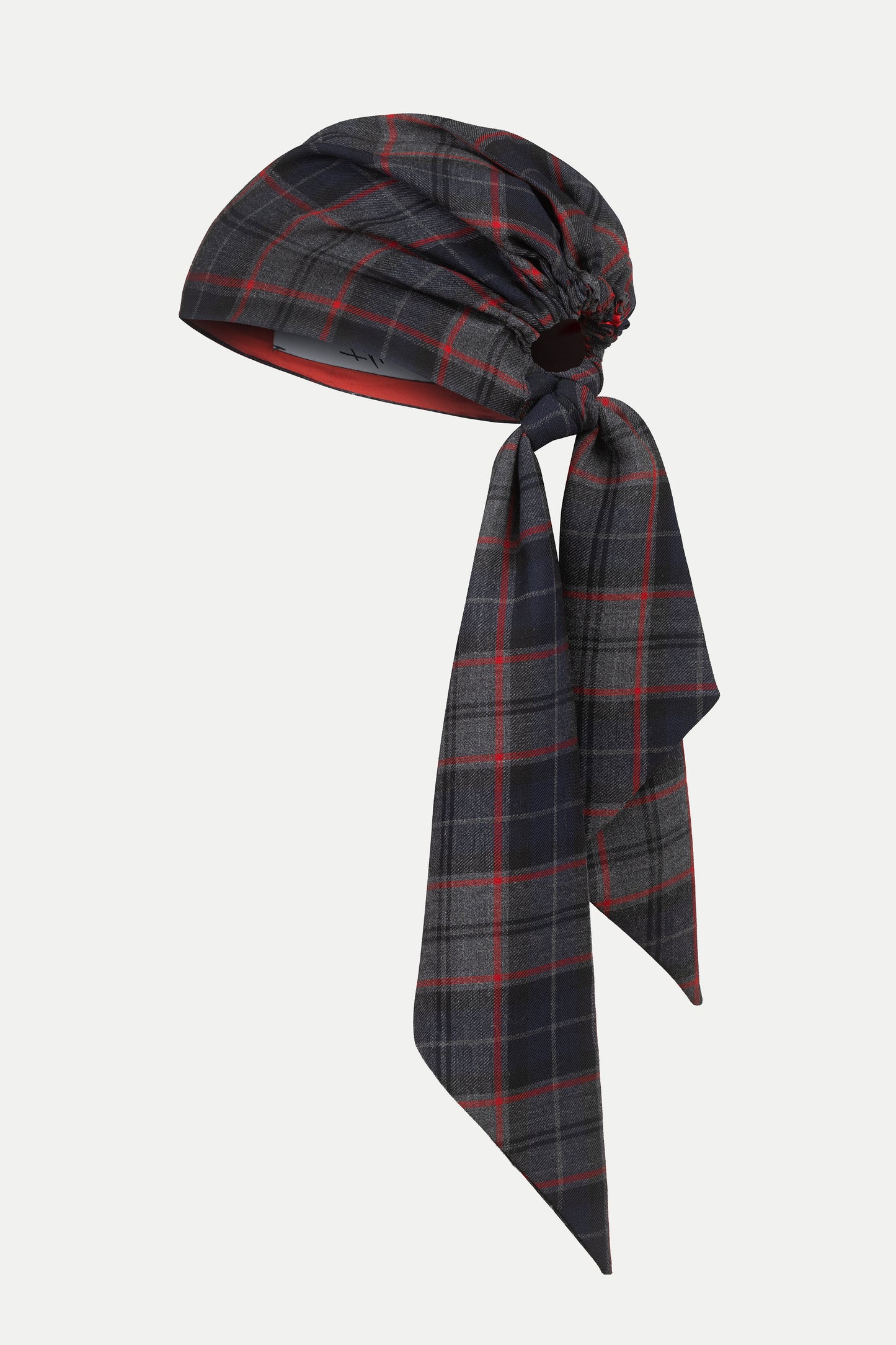 Charcoal and navy tartan wool headscarf with red windowpane lines, worn as an accessory, matches the Ashley TeAdore skirt.