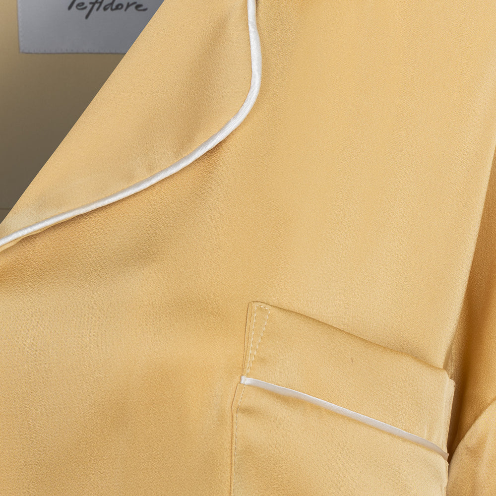 
                  
                    Дамска сатенена парти пижама - риза и дълъг панталон в златен цвят с бял кант  от теадоре 
                  
                