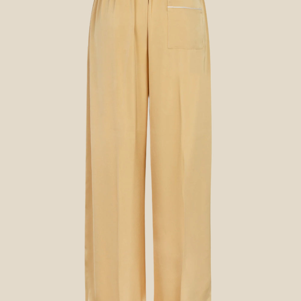 
                  
                    Дамска сатенена парти пижама - риза и дълъг панталон в златен цвят с бял кант  от теадоре 
                  
                