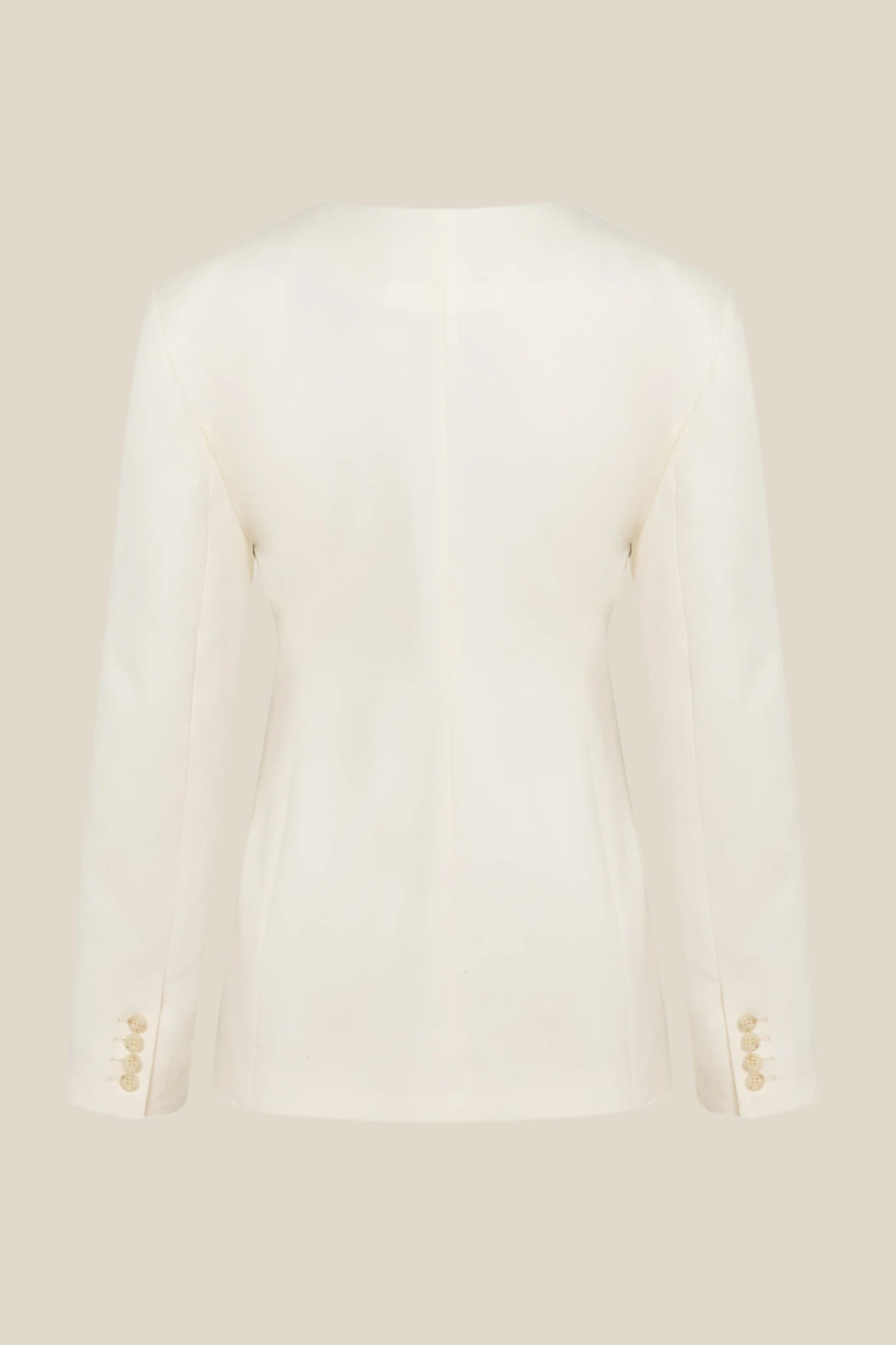 Бяло дамско сако о дънкови бял памучен плат с деконструирана кройка, странично закопчаване и джоб отпред от теадоре