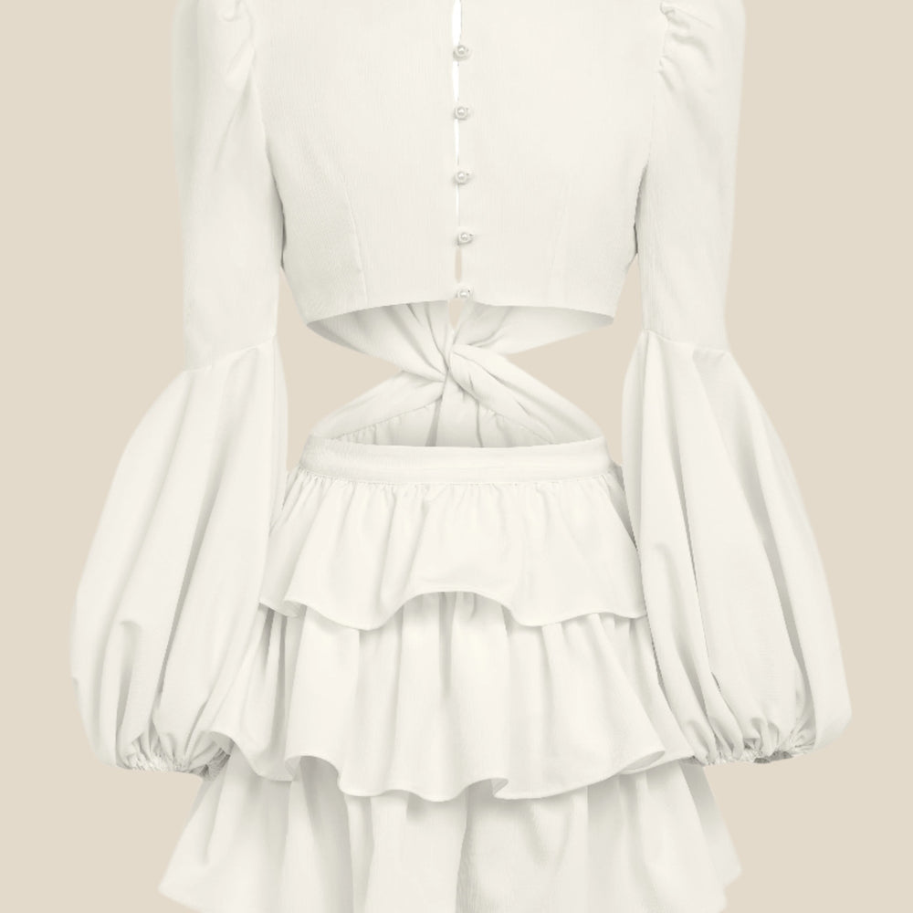 Официална дамска рокля с волани, декоративна катарама и обемни ръкави изработена от 100% бяла коприна от теадоре