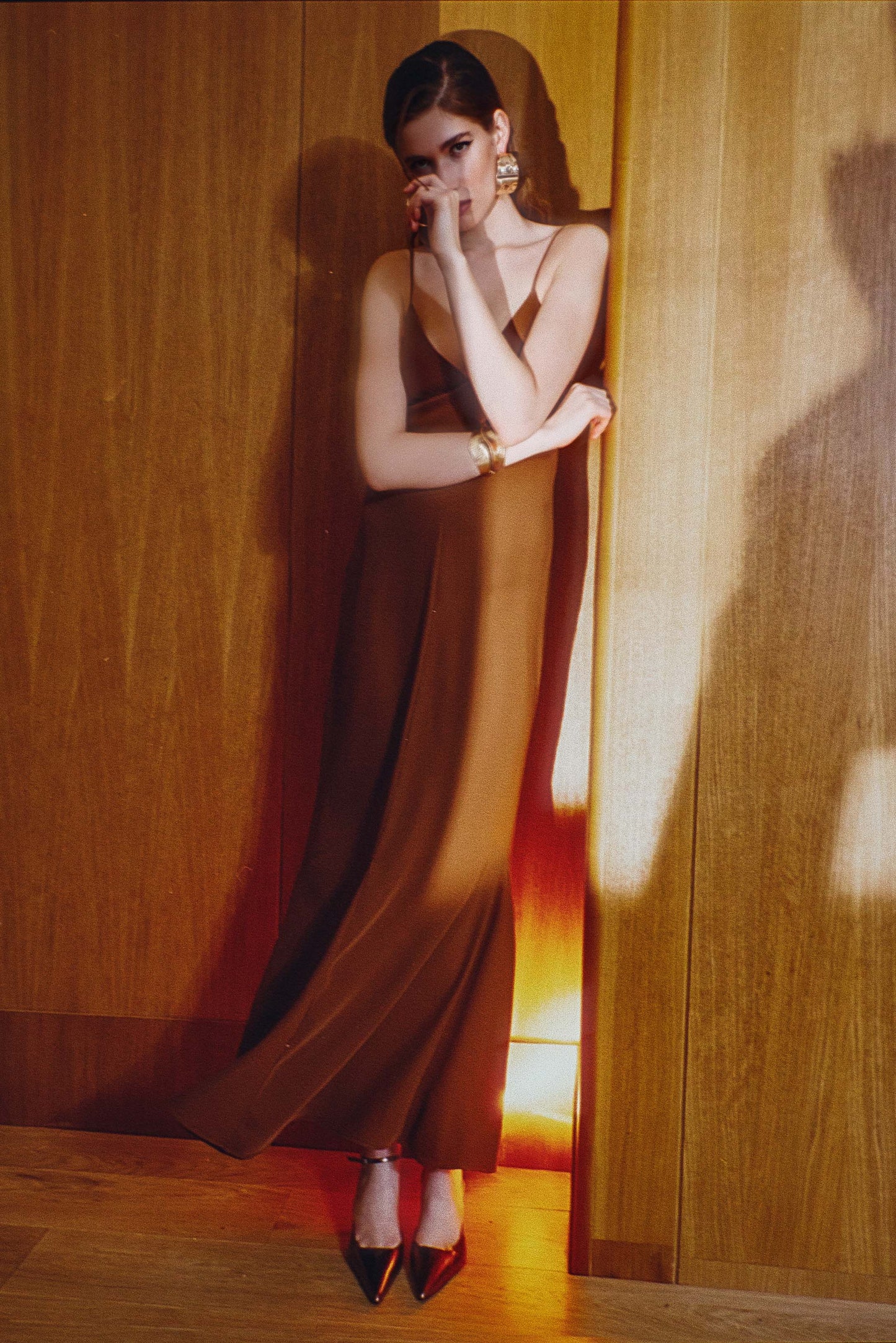 Long brown viscose slip dress with clean V-shaped neckline, slender straps, and gentle hem flare - TeAdore evening wear.