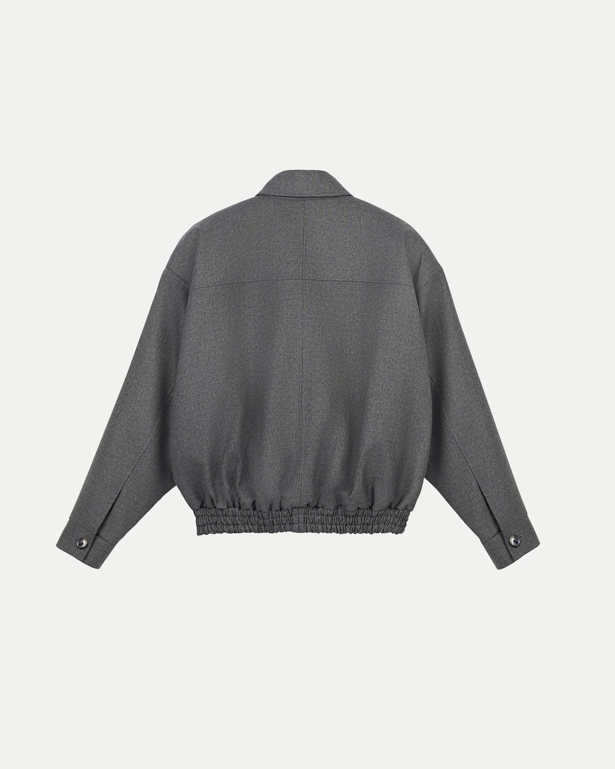 Reverse angle of TeAdore voluminous casual outerwear displaying panel detailing and a tailored back