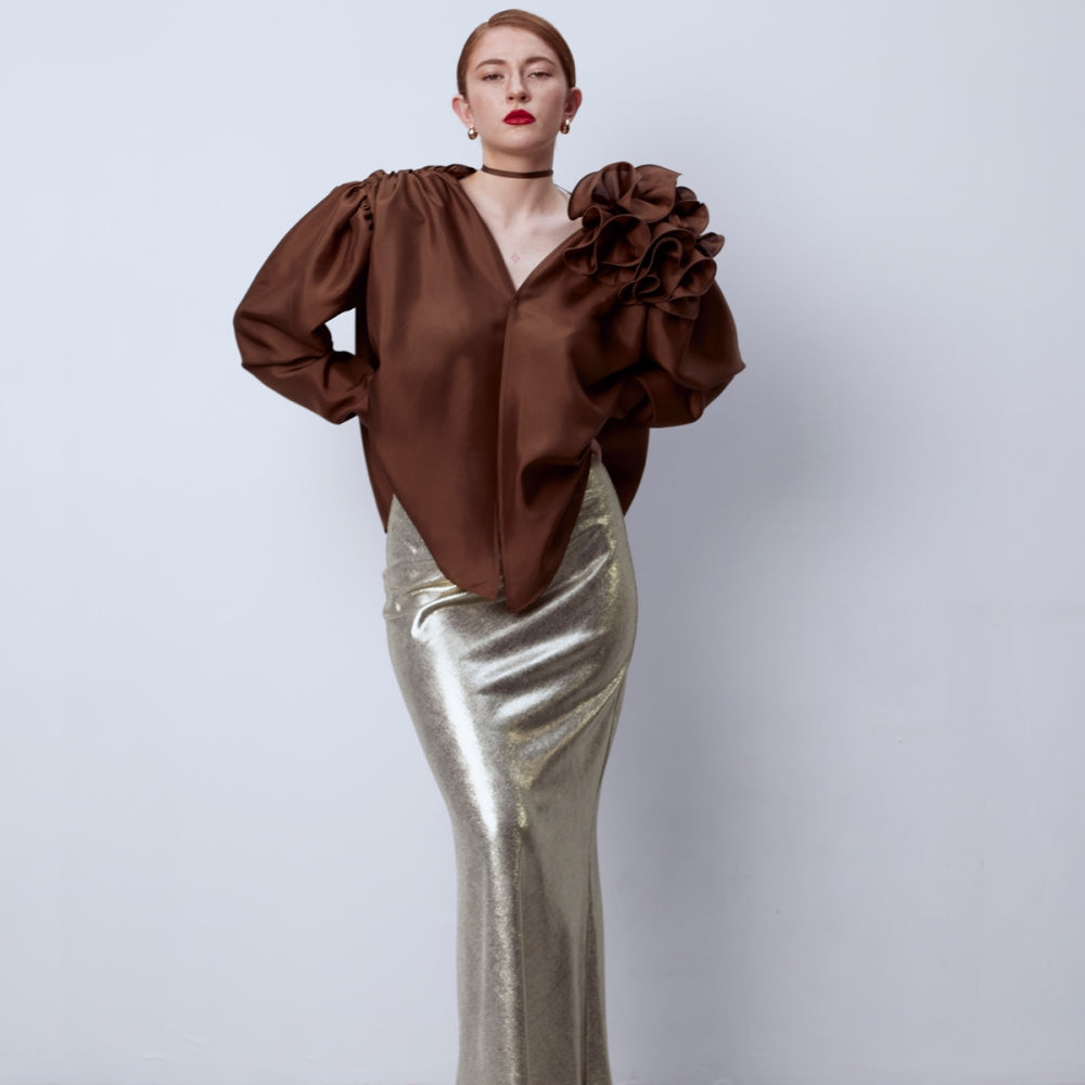 
                  
                    Лъскава златна дълга пола от българския моден бранд теадореп
                  
                