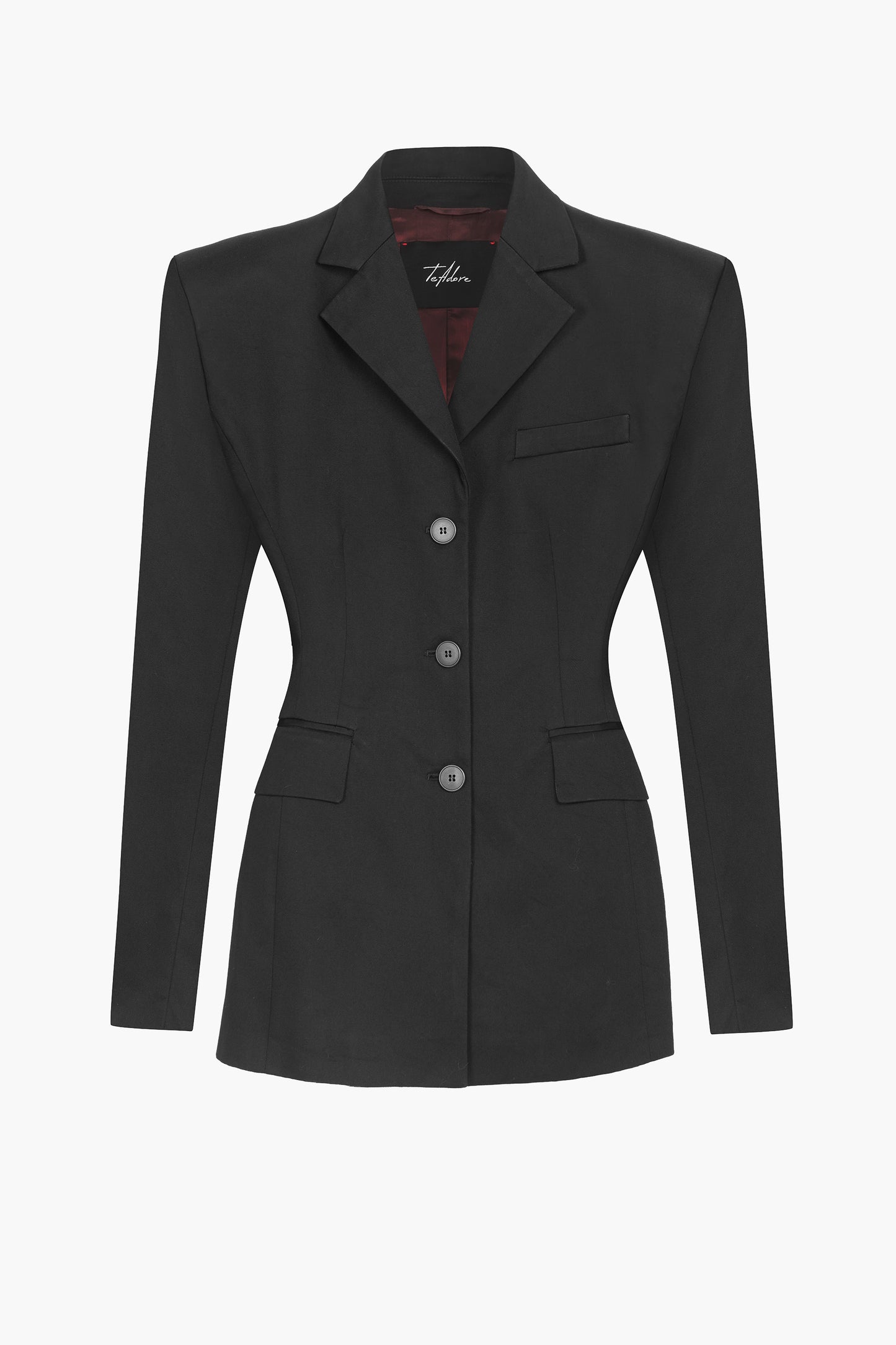 The Amira blazer in 100% cotton with padded shoulders, notched lapels, adjustable back strap, and flap pockets - TeAdore.